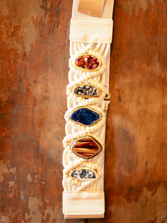 Ceinture élastique beige avec pierres.

100% Polyester
