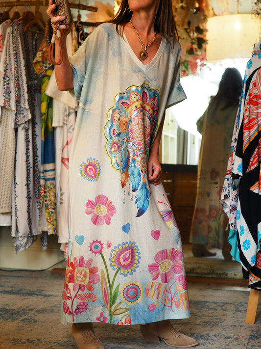 Robe lurex, encolure V. Fentes cotés. Magnifique couleurs..

95% Viscose 5% Elasthane.
Taille unique convient du 36 au 46.
Tour de poitrine 154cm Longueur dos 132cm.